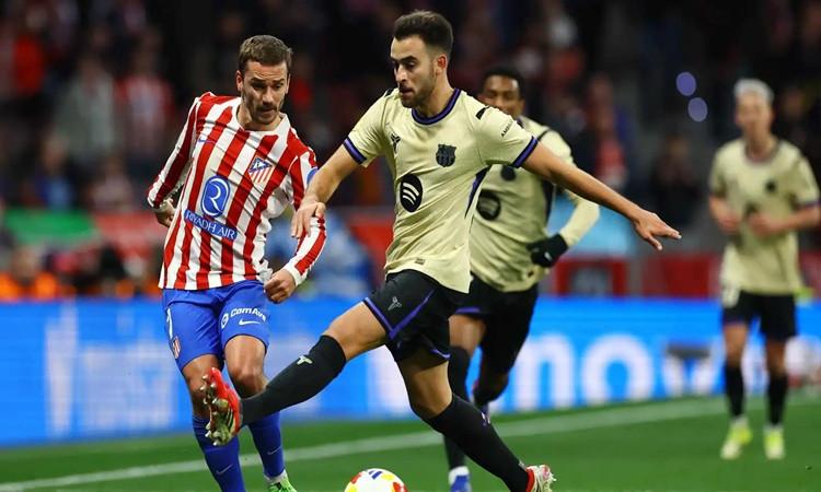 اتليتكو مدريد وبرشلونة